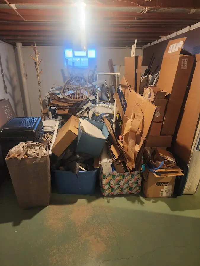 Roll-off dumpster container at job site for Concrete Dumpster Rental in Branford